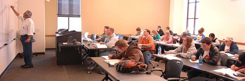 Professor and students in the classroom.